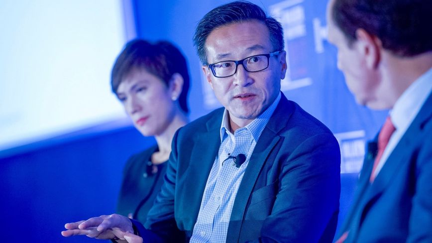 people speaking on a panel